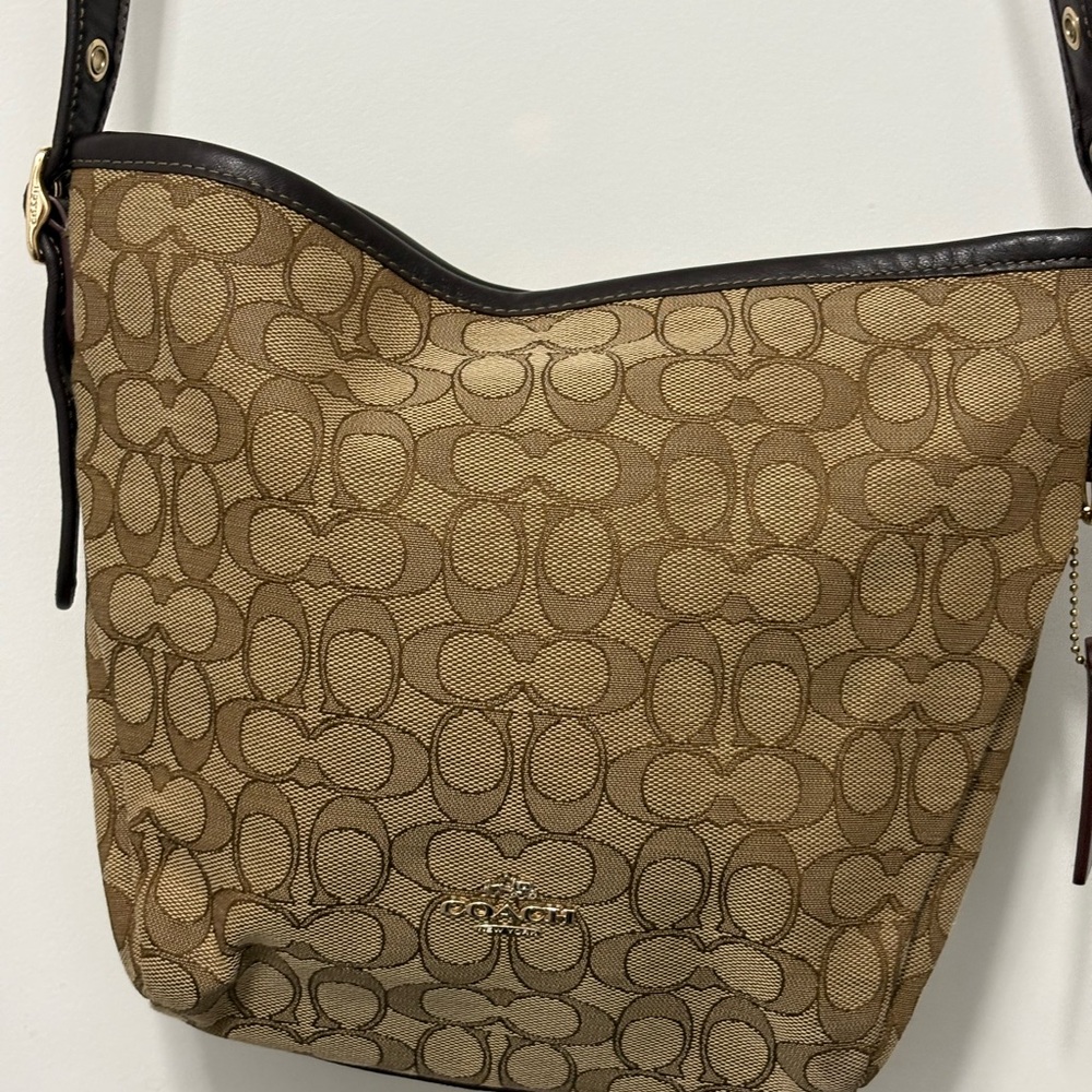 Coach crossbody canvas purse and leather adjustable strap